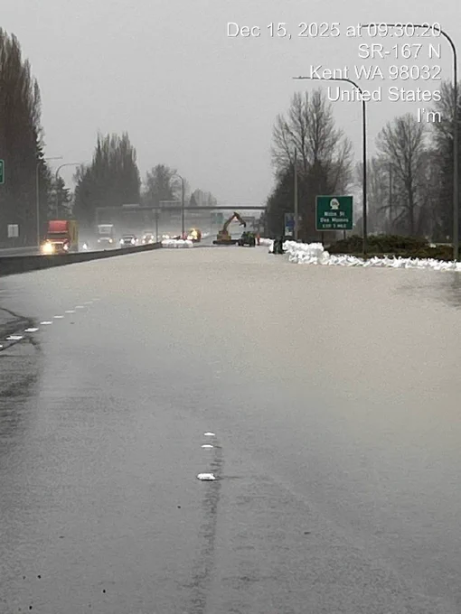 An image from Monday morning, Dec. 15, showing rising floodwater  from the Green River across northbound SR 167. Crews have also closed southbound SR 167 in Kent and Auburn due to rising water. 