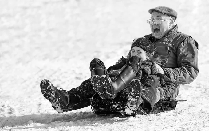 "Sledging with grandad", by Vin Scothern.