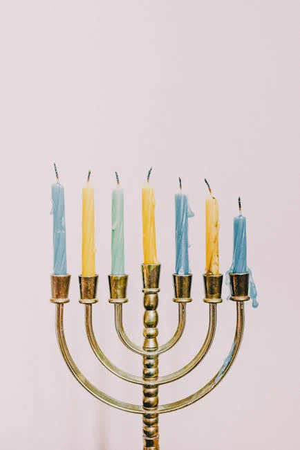 A beautifully adorned menorah with seven colorful candles, symbolizing Hanukkah traditions.