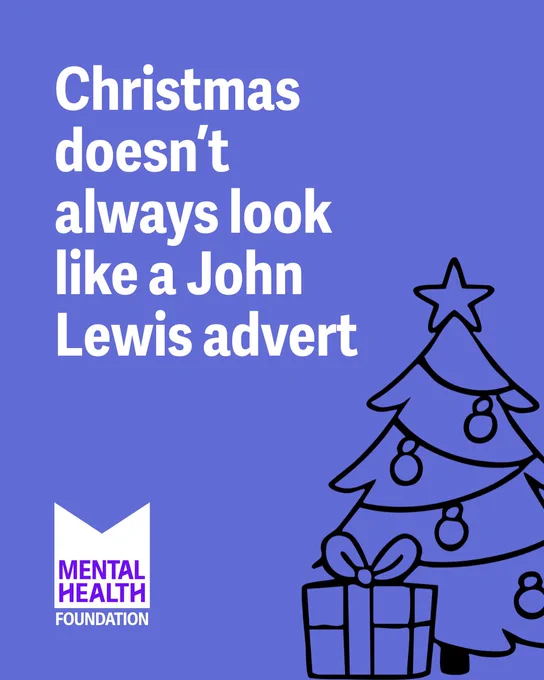 A purple background features white text reading, "Christmas doesn’t always look like a John Lewis advert." To the right, a simple black outline of a decorated Christmas tree with baubles and a star on top sits above a wrapped gift. The Mental Health Foundation logo is in the bottom left corner.