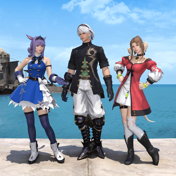  A screenshot of three characters from Final Fantasy 14 Online dressed as characters from Fantasian Neo Dimension.
On the left is a Miqo'te dressed as Cheryl wearing a tiara over her short bangs with the rest of her hair pulled back in a curled bun. She is wearing a sleeveless blue dress with a frilly white petticoat and sheer stockings and white boots.
In the middle is a Hyur dressed as Leo with short hair swayed back in spiked segments and a black headband. They are wearing a black neck high coat with short sleeves and golden buttons open from the bottom. He has white loose pants and metal boots on. 
On the right is an Au Ra dressed as Kina with their hair up in a ponytail and their bangs hanging loosely. They are wearing a mid-length red dress with long sleeves opening to reveal a white undershirt. They have knee-high stockings with flower embroidery and calf-high black boots.
