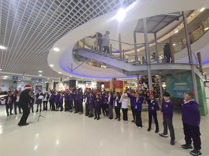 A pic from the festive singalong for the Crowland Primary School Choir at The Mall Wood Green today.