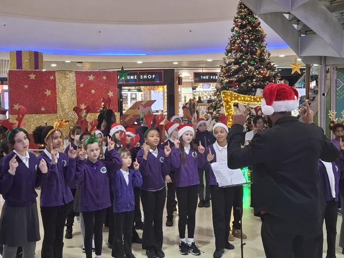 A pic from the festive singalong for the Crowland Primary School Choir at The Mall Wood Green today.