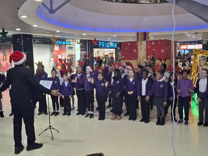 A pic from the festive singalong for the Crowland Primary School Choir at The Mall Wood Green today.