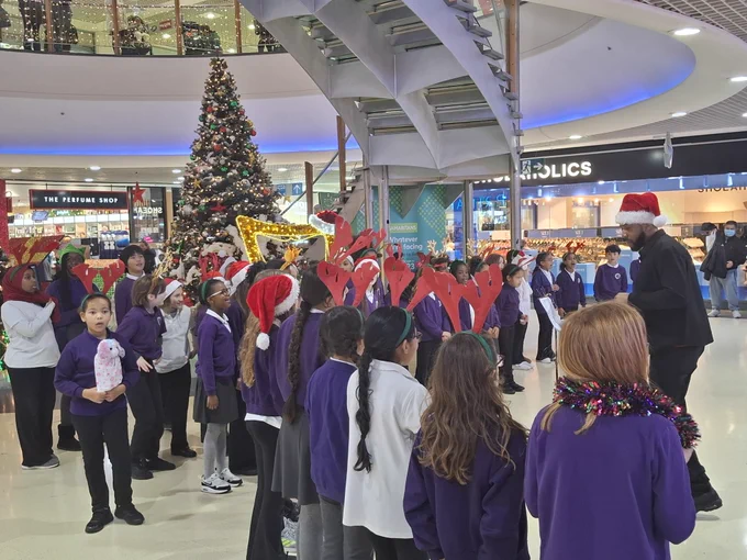 A pic from the festive singalong for the Crowland Primary School Choir at The Mall Wood Green today.