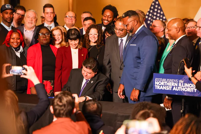 Governor JB Pritzker signed the Northern Illinois Transit Authority (NITA) Act, SB2111, into law, marking a landmark action in modernizing Illinois’ transit system. The law creates a new regional authority to oversee CTA, Metra, and Pace, while delivering significant investments in public transit, capital projects, and tollways across the state—all without raising statewide taxes.