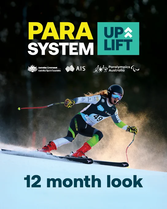 An athlete competes in a nighttime Paralympic skiing event, prominently displaying sponsorship logos including Paralympics Australia and the Australian Institute of Sport.
