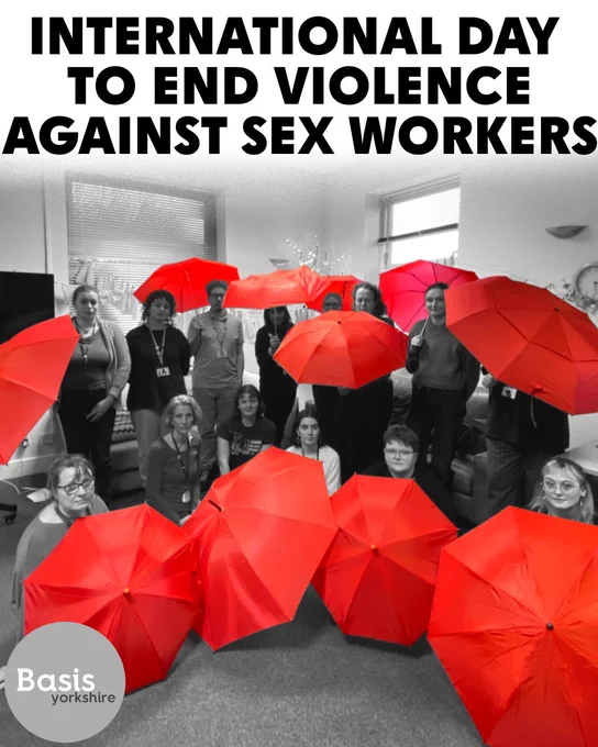 Photo of 14 people in black and white, looking emotionless to the camera. They hold 11 red umbrellas. Basis Yorkshire logo in black and white. Text reads: INTERNATIONAL DAY TO END VIOLENCE AGAINST SEX WORKERS