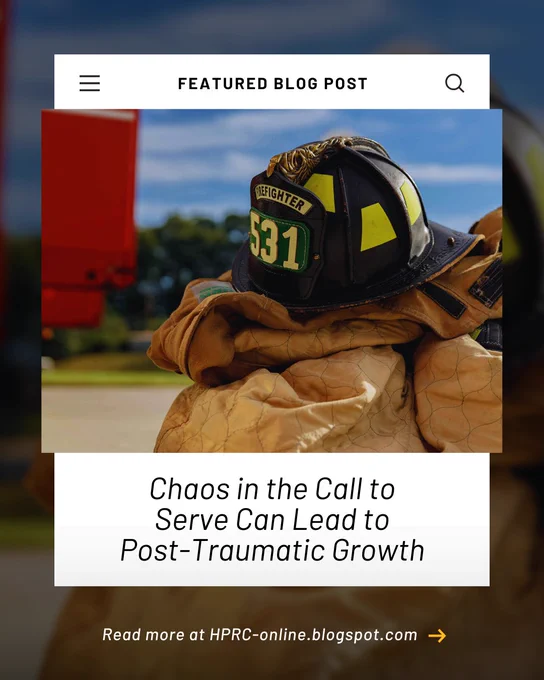 Close-up of a firefighter helmet labeled 531 resting on folded protective gear outdoors under a clear sky.
