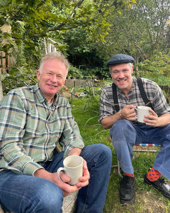 Toby Buckland having a cup of tea with Will Young in his new garden