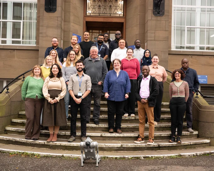 The LRCFS team stood outside the Ewing building