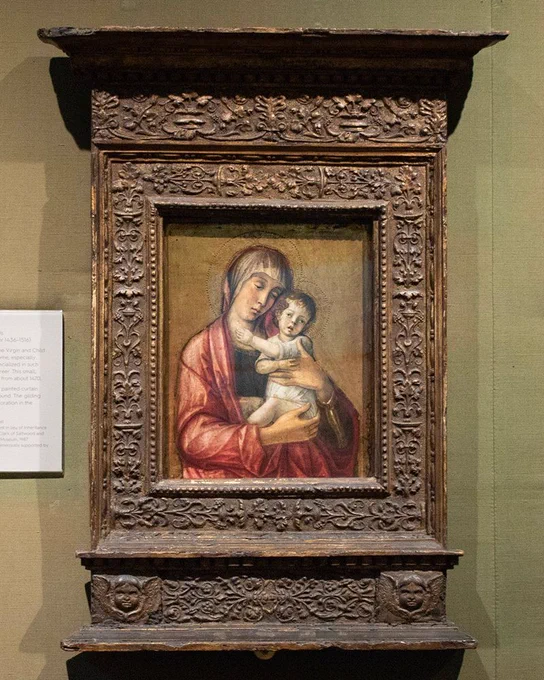 The Virgin and Child by Giovanni Bellini framed in a large ornate frame