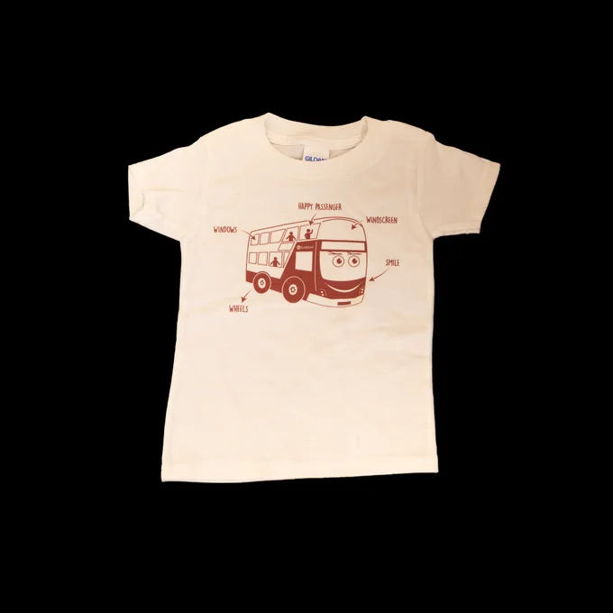 Cream-colored t-shirt featuring a red cartoon double-decker bus with labeled parts like windows, wheels, and smile.