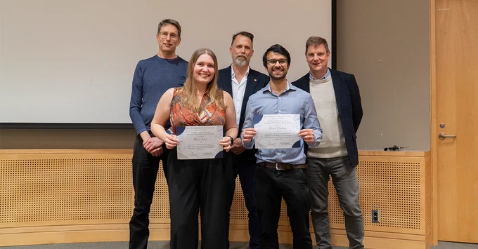 Pictured together in the MSL seminar room are, from left to right: Michael Murphy (Head, Department of Microbiology and Immunology), Marie Johns (fellowship recipient), Martin Hirst (Director, Michael Smith Laboratories), Abishek Wadhwa (fellowship recipient), and Paul Moore (Zymeworks). The two recipients are holding their award certificates, presented at the seminar.
