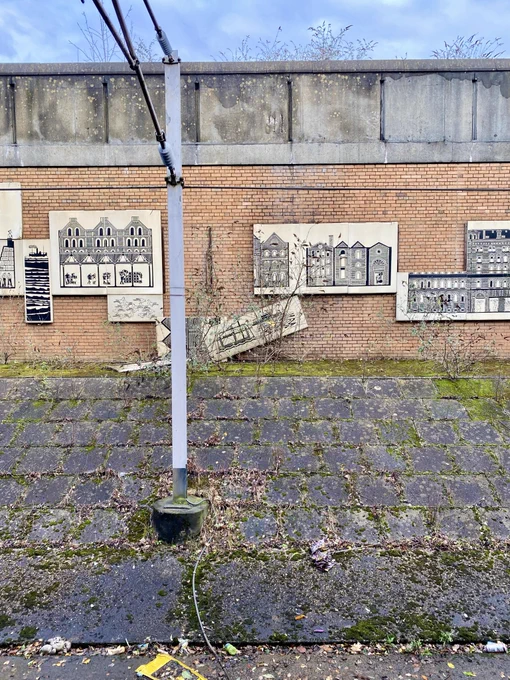 This is a detail of Glasgow artist Willie Rodger’s 1988 mural at Exhibition Centre Station. The 29 panels of the mural depict 100 years of Finnieston’s history but sadly are in a bad way with many having fallen off.