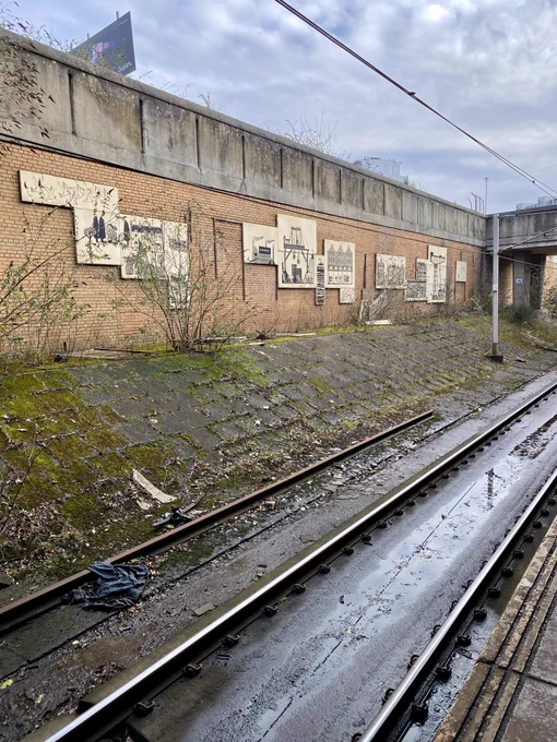This is Glasgow artist Willie Rodger’s 1988 mural at Exhibition Centre Station. The 29 panels of the mural depict 100 years of Finnieston’s history but sadly are in a bad way with many having fallen off.