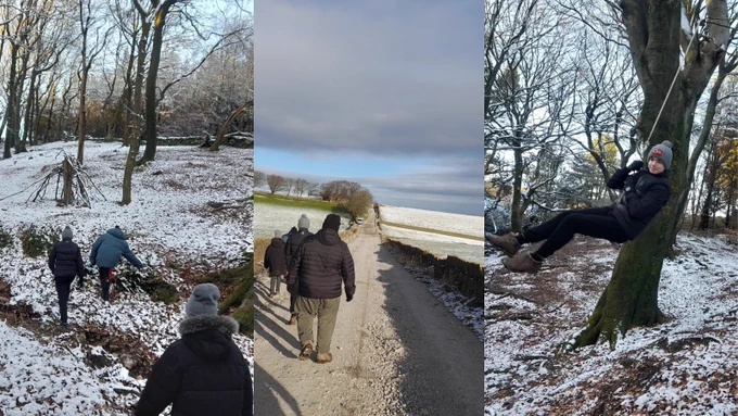 Three-panel image showcasing outdoor scenes. First panel: People building a structure with sticks in a snowy forest. Second panel: Group walking along a rural path beside an open field under a cloudy sky. Third panel: Individual sitting on a tree branch, smiling, in a snowy woodland setting.
