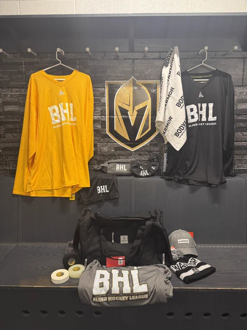 All of the swag is set up on the bench inside the Vegas Golden Knights, practice facility, dressing room. Including two jerseys, hats, a towel, fresh bag, and hockey tape.