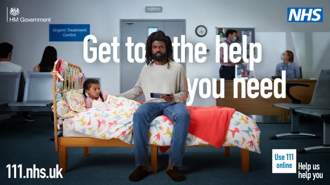 A man sat on a bed with their child who looks unwell. He is holding a mobile phone in his hand. The bed is in the middle of anurgent treatment centre waiting room.

The headline text reads: "Get to the help you need"

The help us help you logo features in the bottom right of the image. The NHS logo features in the top right of the image.