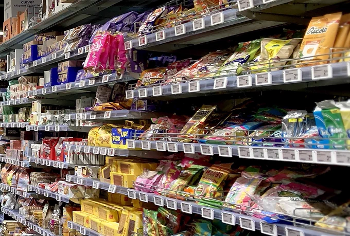 A bright, well-organized supermarket aisle packed with juices, snacks, and everyday groceries, creating a colorful and inviting shopping experience.

https://www.istockphoto.com/portfolio/Pandza?mediatype=photography

#supermarket #groceryaisle #retail #foodshopping #snacks #beverages #storeinterior #shelflife #everydaygroceries #modernretail