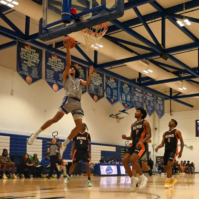 North Lake men’s basketball’s Jayden Cruz glides toward the basket in the Blazers’ 74-73 win over Cedar Valley.