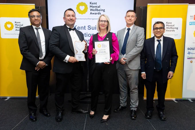 Presenting the award were Dr Anjan Ghosh from Kent County Council, Lee Woolcott-Ellis from Southeastern and our VIP speaker Dr Kush Kanodia. Emma and Tristan Kluibenschadl are smiling and stood in the middle holding their trophy and winner's certificate
