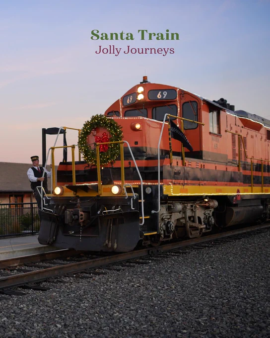 Santa Train titled 'Jolly Journeys' featuring a brightly decorated orange locomotive with a conductor standing at the rear, captured at dusk.