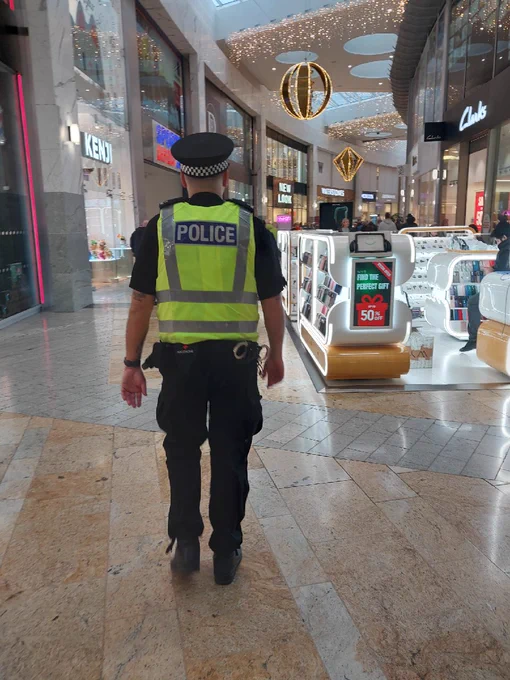 officer in uniform walking through Silverburn