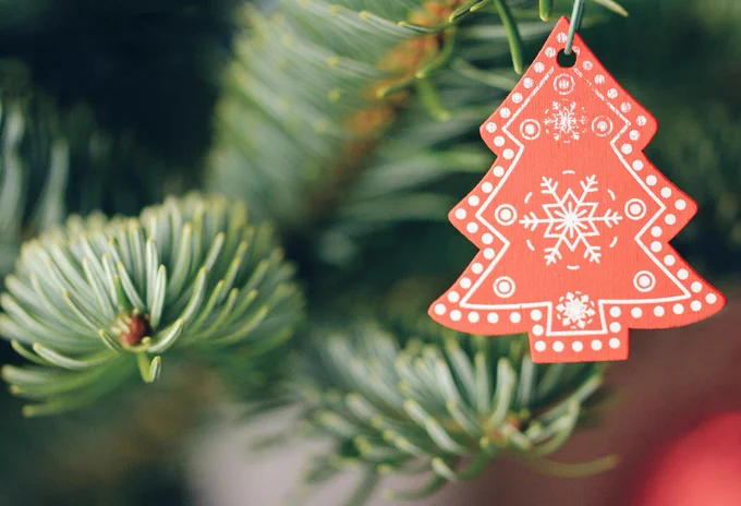 A Christmas tree-shaped decoration on a Christmas tree