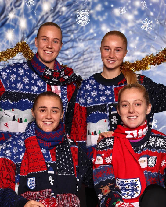 Mead, Blindkilde Brown, Stanway and Walsh pose in Christmas jumpers, scarves and tinsel.