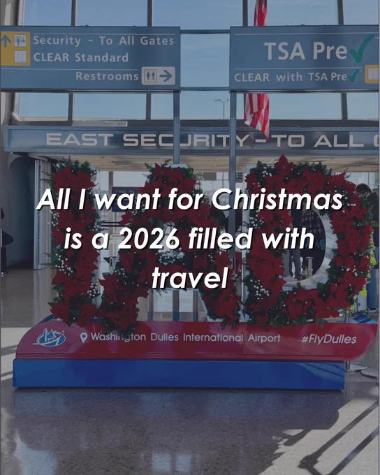 Promotional image from Washington Dulles International Airport featuring a festive holiday decoration and a message saying 'All I want for Christmas is a 2026 filled with travel'.