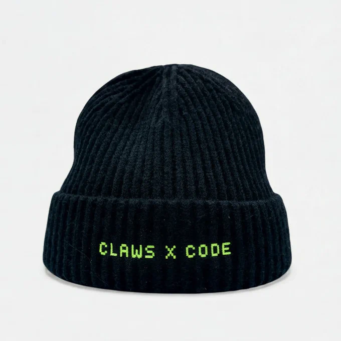 Claws x Code: Black ribbed beanie in volt green or hot pink. Perfect for coders, streamers & creators. Soft, warm, machine washable. Shop now.