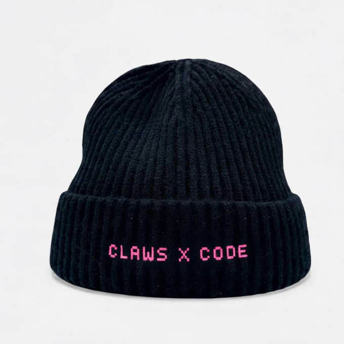 Claws x Code: Black ribbed beanie in volt green or hot pink. Perfect for coders, streamers & creators. Soft, warm, machine washable. Shop now.