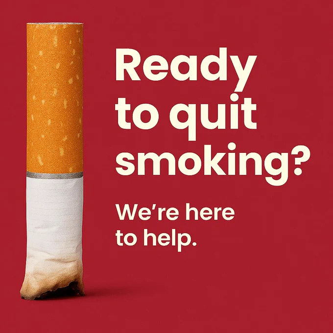 A cigarette butt standing upright against a solid red background. Large bold white text to the right reads: “Ready to quit smoking?” Below in smaller text: “We’re here to help.”