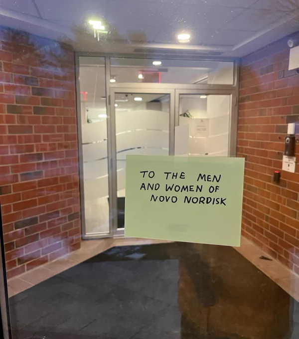 "To the Men and Women of Novo Nordisk", card on office door
