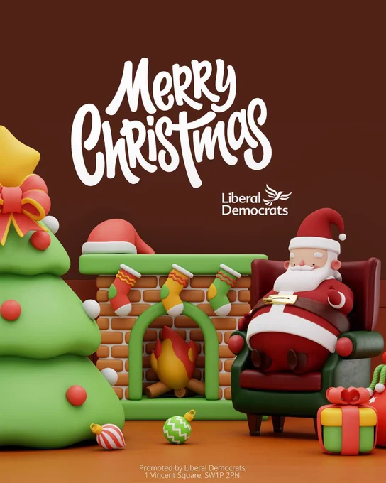 A 3D-style festive graphic with a seated Santa Claus next to a fireplace with stockings and a decorated Christmas tree. Large white text reads "MERRY CHRISTMAS" with the Liberal Democrats logo.