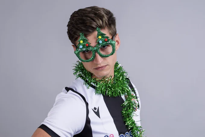 Flint Town United’s Elliott Reeves wearing Christmas accessories.