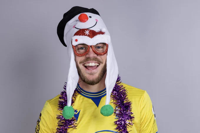 Barry Town United’s Mikey George wearing Christmas accessories.