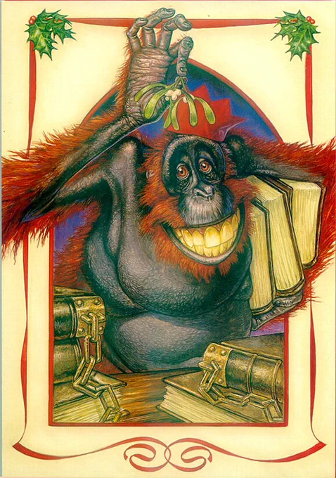 The Librarian from Unseen University holding up a sprig of mistletoe and grinning broadly. As drawn by Paul Kidby