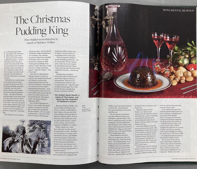 Image showing page 28 and 29 of the article in the Derbyshire Life magazine entitled 'The Christmas Pudding King. Peter Seddon turns detective in search of Matthew Walker'. It features a photograph of a Christmas pudding on a dining table and a photo of the Christmas Pudding King himself astride a horse.