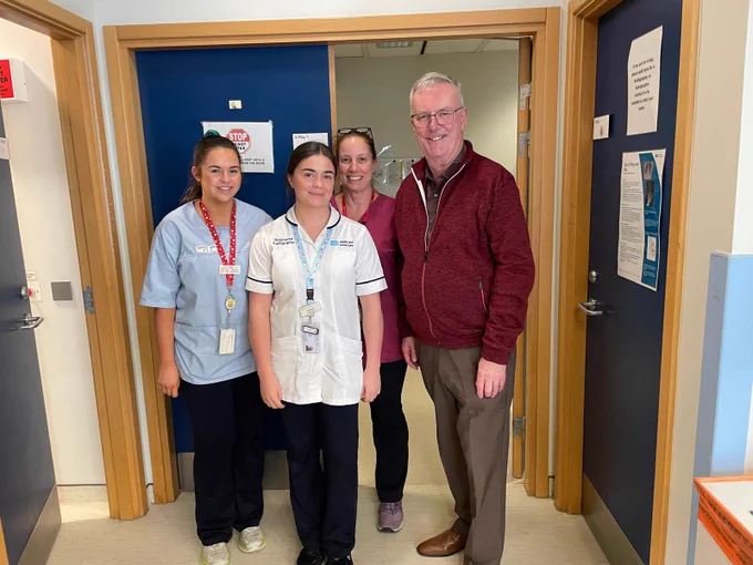 The Health Minister Mike Nesbitt with staff at Antrim Area Hospital Emergency Department