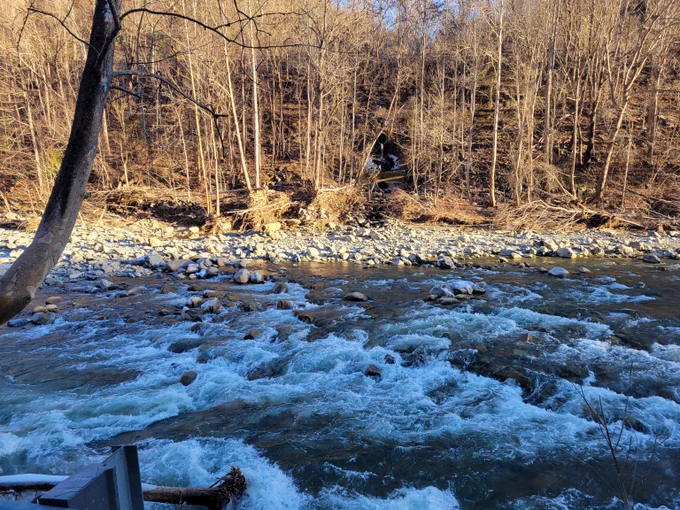 A rocky river with rapids.
