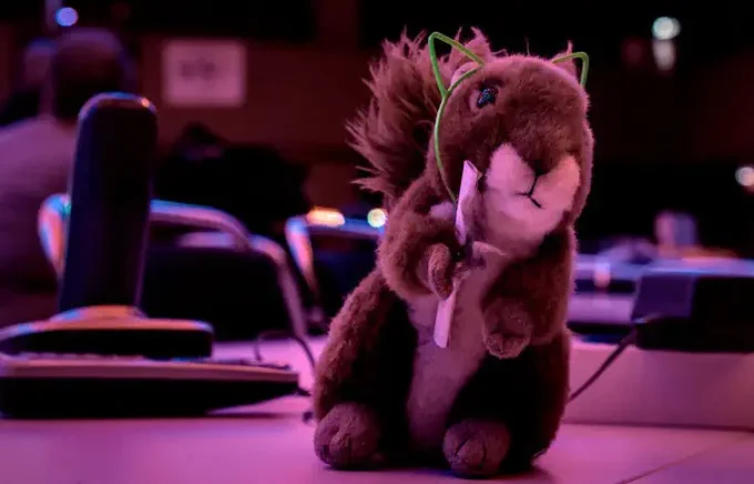 The KITCTF mascot on a table at 38c3.