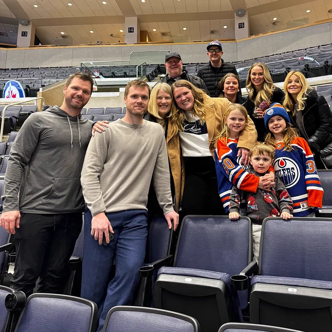 Calvin Pickard poses for a photo with his family