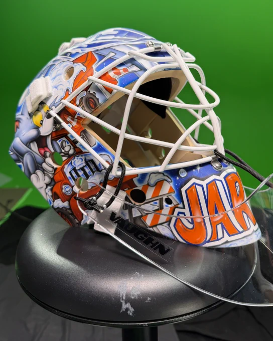 Close-up photo of Tristan Jarry's newly-painted Oilers goalie mask