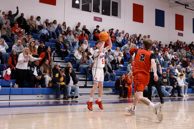 Landon Koepsel prepares to take a 3 point shot against Sissonville.