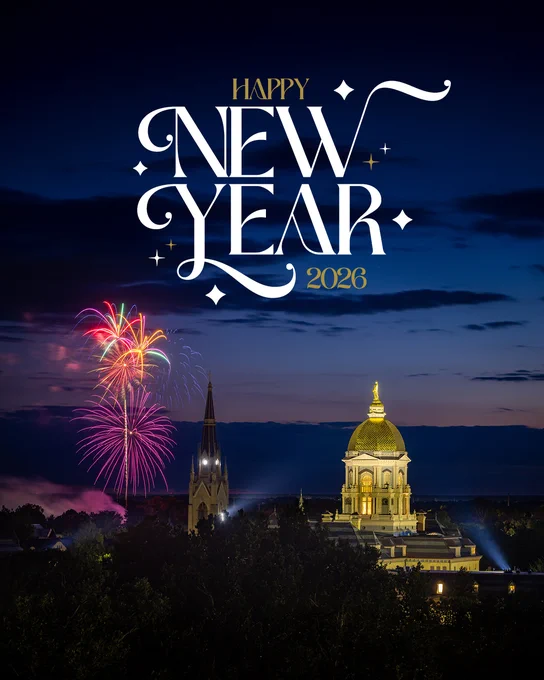 "Happy New Year 2026" text over an image of fireworks above the Basilica of the Sacred Heart and Golden Dome of the Main Building at the University of Notre Dame at night.