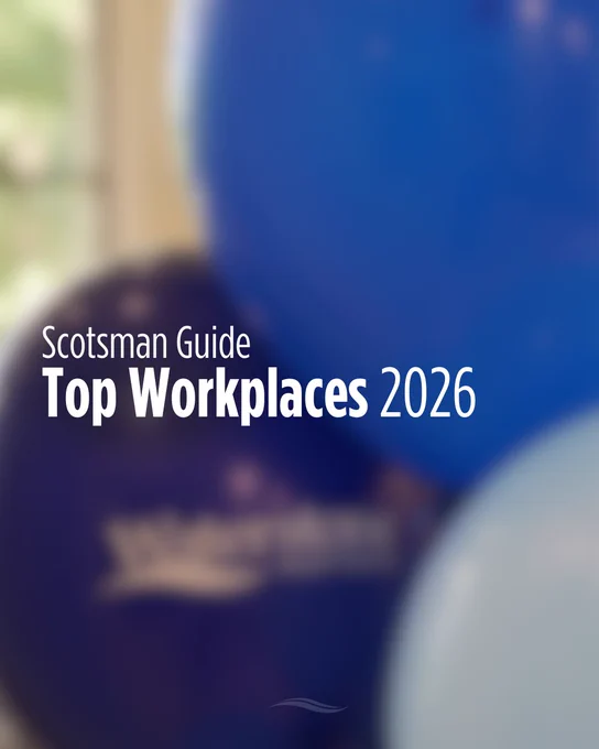 Blue and purple balloons with text: "Scotsman Guide Top Workplaces 2026."