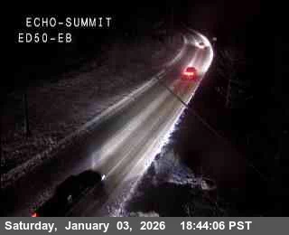 Caltrans webcam shows snow covered roads at Echo Summit on Highway 50.