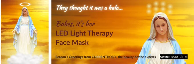 Billboard advert image featuring the Virgin Mary with the caption “they thought it was a halo… Babes, it’s her LED light therapy face mask. Seasons Greetings from Current Body, the beauty device experts.”
